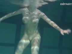 CrocoList presents: Naked brunette with big tits swims solo