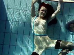 CrocoList presents: In black stockings pretty girl goes for a swim