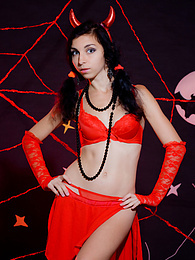 CrocoList presents: Only one look in the eyes of this fantastic slim teen will tell that she is a little devil inside. No further costume is needed.