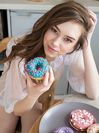 CrocoList presents: If you are a fan of skinny girls, check out how this cute little doll poses and teases totally naked in the kitchen.