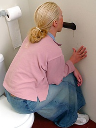 CrocoList presents: Blonde girl Jamie sits on the toilet and blows a black gloryhole dong